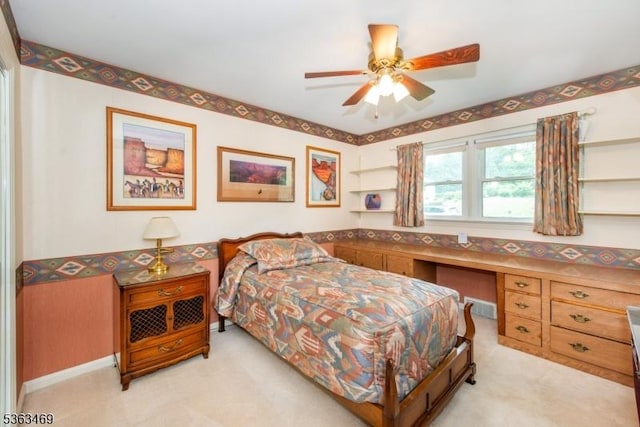 38 Longview Dr, Hanover Twp, NJ 07981 - bedroom featuring built in desk, light carpet, and a ceiling fan