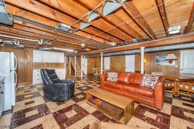 38 Longview Dr, Hanover Twp, NJ 07981 - finished basement featuring freestanding refrigerator, light flooring, wood walls, and stairs