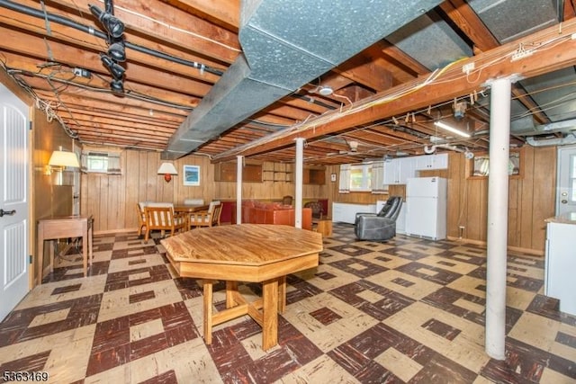 38 Longview Dr, Hanover Twp, NJ 07981 - below grade area with freestanding refrigerator, tile patterned floors, and wood walls