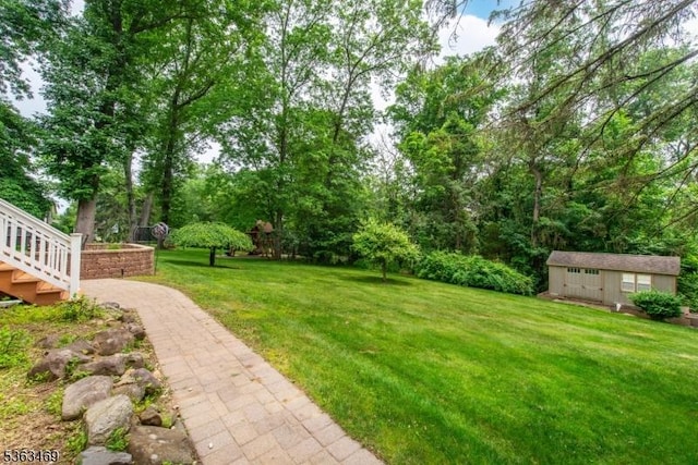 38 Longview Dr, Hanover Twp, NJ 07981 - view of green lawn featuring an outdoor structure