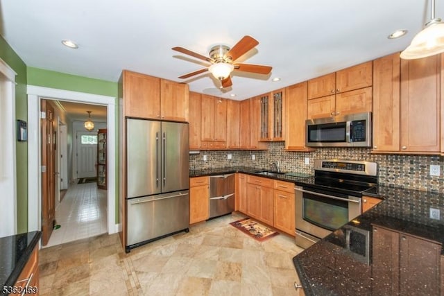 38 Longview Dr, Hanover Twp, NJ 07981 - kitchen with stainless steel appliances, tasteful backsplash, ceiling fan, dark stone countertops, and recessed lighting