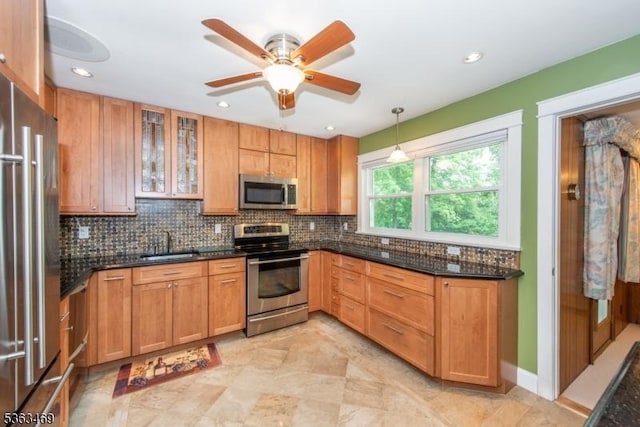 38 Longview Dr, Hanover Twp, NJ 07981 - kitchen with appliances with stainless steel finishes, backsplash, ceiling fan, hanging light fixtures, and glass insert cabinets