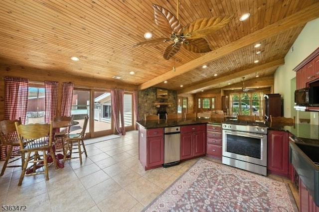 34 Millbrook Rd, Harding Twp, NJ 07976 - kitchen with stainless steel gas stove, wooden ceiling, plenty of natural light, dark countertops, and reddish brown cabinets