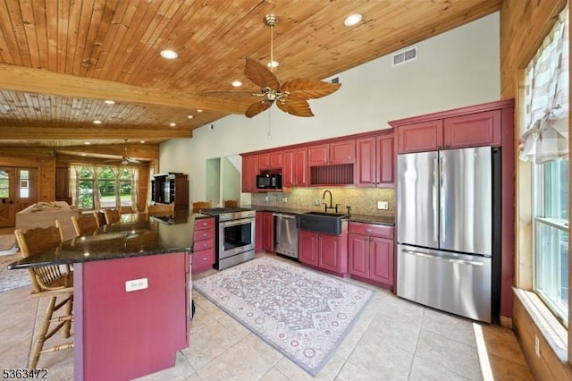 34 Millbrook Rd, Harding Twp, NJ 07976 - kitchen featuring stainless steel appliances, ceiling fan, dark brown cabinets, open floor plan, and tasteful backsplash