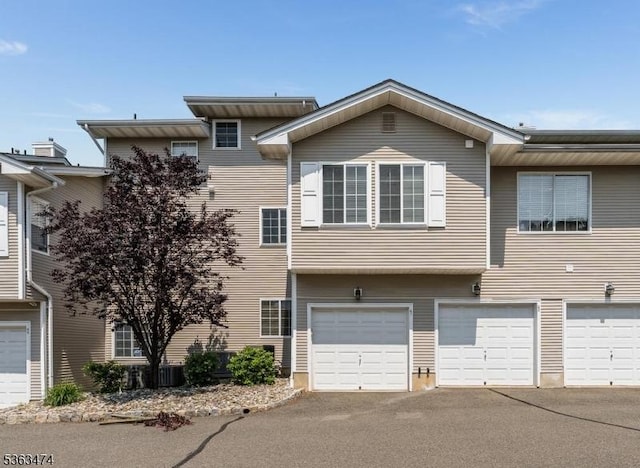 47 Crestmont Rd, Bedminster Twp, NJ 07921 - townhome / multi-family property with driveway and an attached garage