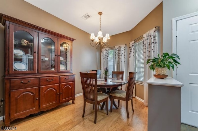 47 Crestmont Rd, Bedminster Twp, NJ 07921 - dining space with a chandelier, light wood-style floors, and baseboards