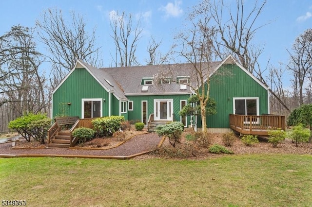 28 David Post Rd, Clinton Twp, NJ 08801 - rear view of house with a deck and a lawn