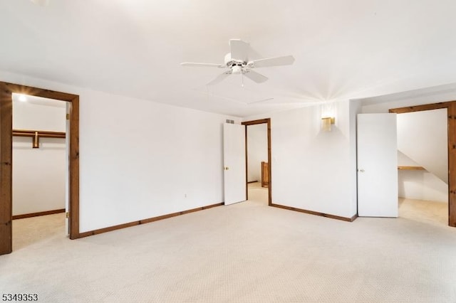 28 David Post Rd, Clinton Twp, NJ 08801 - unfurnished bedroom with light colored carpet, a spacious closet, baseboards, and a ceiling fan