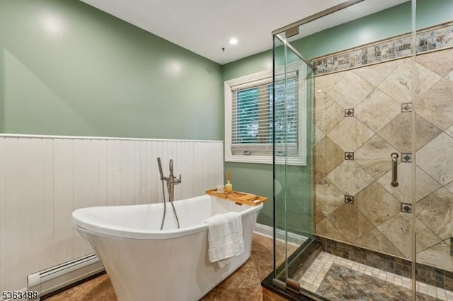 11 Wynding Way, Rockaway Twp, NJ 07866 - bathroom featuring a baseboard heating unit, a freestanding bath, a stall shower, and a wainscoted wall