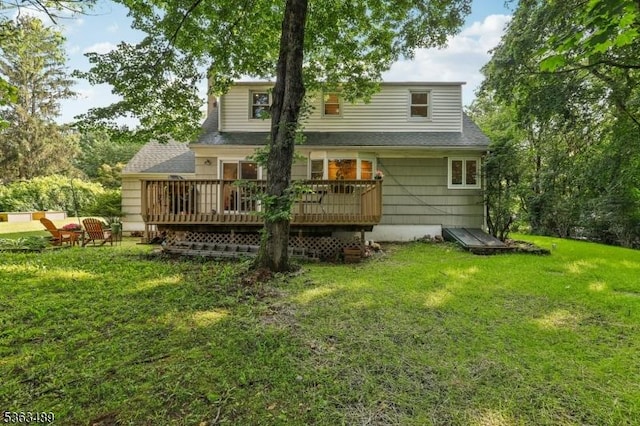 11 Wynding Way, Rockaway Twp, NJ 07866 - rear view of house with a deck, a lawn, and a shingled roof