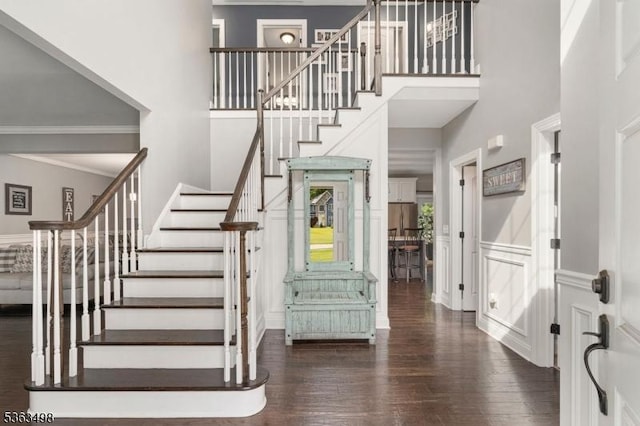 24 Eagles Nest Rd, Green Twp, NJ 07860 - entrance foyer featuring a high ceiling, wood finished floors, stairs, and crown molding