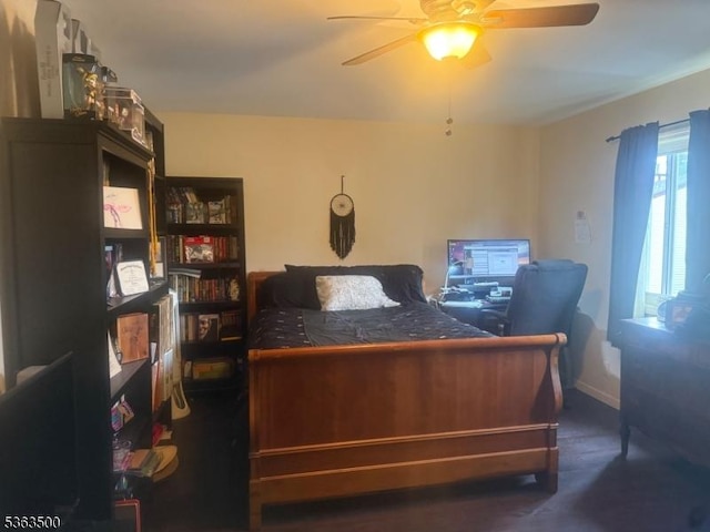 55 Canterbury Ln Unit 55, New Milford Boro, NJ 07646 - carpeted bedroom with a desk and ceiling fan