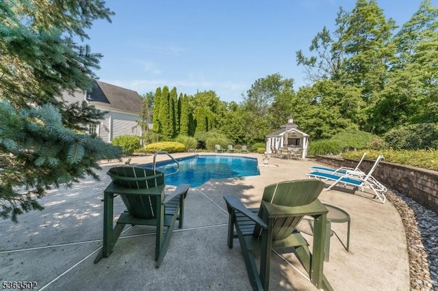 4 Fisher Ct, Raritan Twp, NJ 08822 - view of swimming pool with a storage structure, a patio, and an outdoor structure