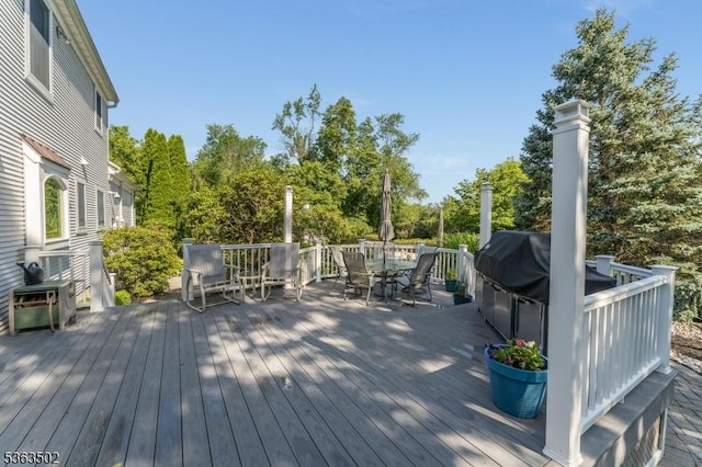 4 Fisher Ct, Raritan Twp, NJ 08822 - wooden deck featuring outdoor dining space and view of scattered trees