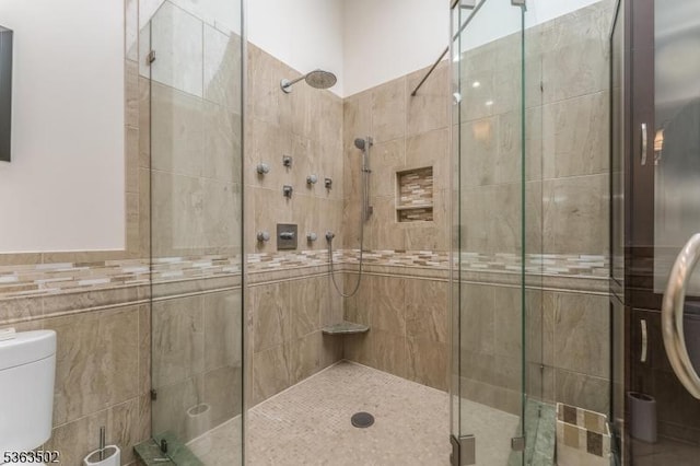 4 Fisher Ct, Raritan Twp, NJ 08822 - bathroom featuring a stall shower and tile walls