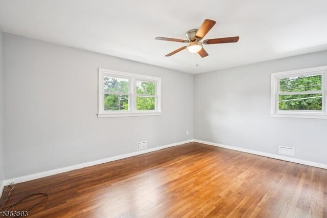 2 Linden Ave, West Orange Twp, NJ 07052 - spare room featuring plenty of natural light, wood finished floors, and a ceiling fan