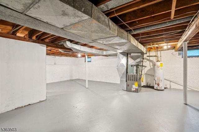 2 Linden Ave, West Orange Twp, NJ 07052 - unfinished below grade area featuring water heater and heating unit