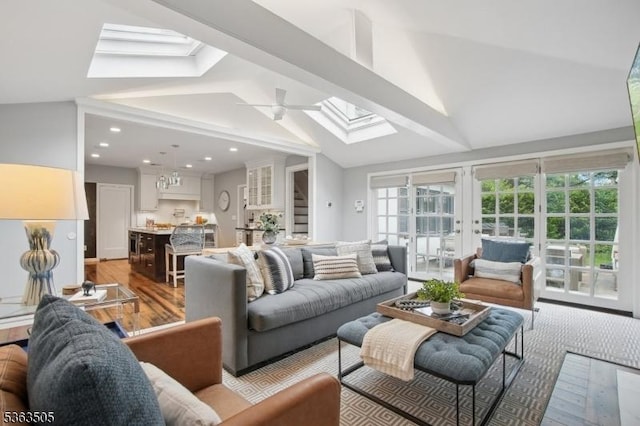 508 Park St, Montclair Twp, NJ 07043 - living area featuring a skylight, lofted ceiling, french doors, light wood finished floors, and recessed lighting