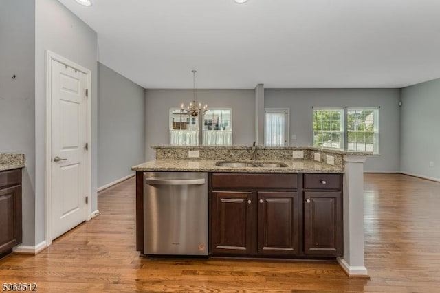 84 Washington Square Cir, Washington Boro, NJ 07882 - kitchen featuring dishwasher, light wood-style flooring, a chandelier, dark brown cabinetry, and a kitchen island with sink