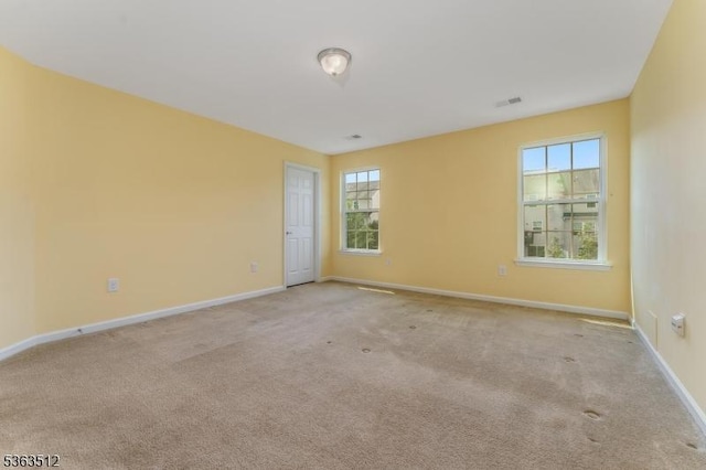 84 Washington Square Cir, Washington Boro, NJ 07882 - carpeted empty room with healthy amount of natural light