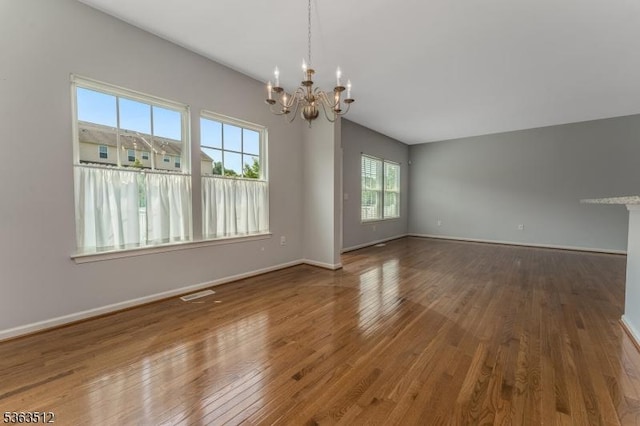 84 Washington Square Cir, Washington Boro, NJ 07882 - spare room featuring a chandelier and wood finished floors