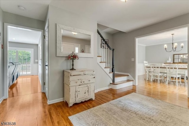 5 Brendan Dr, Mount Olive Twp, NJ 07836 - entrance foyer featuring stairs, wood finished floors, and a chandelier