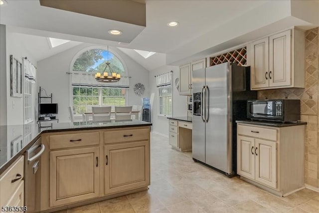 5 Brendan Dr, Mount Olive Twp, NJ 07836 - kitchen featuring black microwave, a chandelier, lofted ceiling, dark countertops, and stainless steel fridge