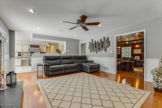 5 Brendan Dr, Mount Olive Twp, NJ 07836 - living area with ceiling fan, light wood-style floors, wainscoting, and recessed lighting
