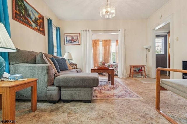 255 Ampere Pkwy, Bloomfield Twp, NJ 07003 - carpeted living area with plenty of natural light and a chandelier