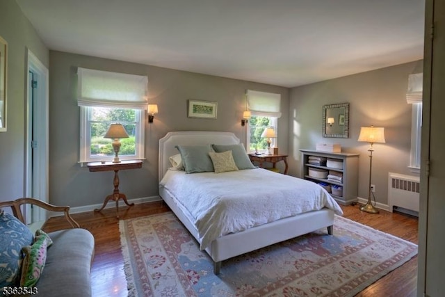21 Sycamore Hill Rd, Bernardsville Boro, NJ 07924 - bedroom featuring radiator, multiple windows, and wood finished floors