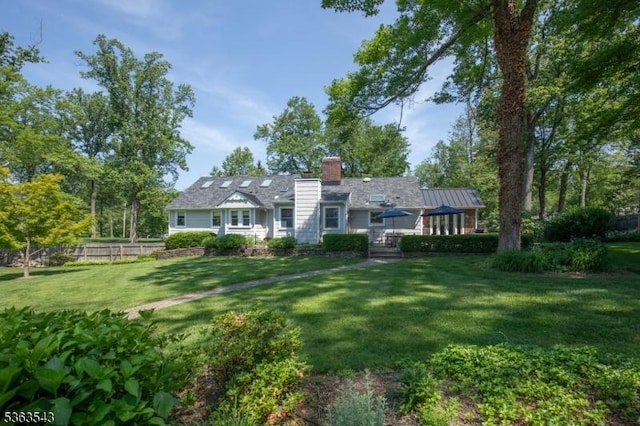 21 Sycamore Hill Rd, Bernardsville Boro, NJ 07924 - rear view of property with a chimney and a wooden deck