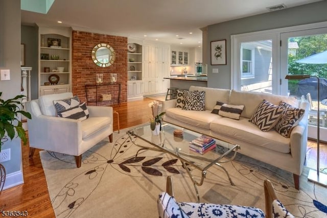21 Sycamore Hill Rd, Bernardsville Boro, NJ 07924 - living area with light wood finished floors and built in features