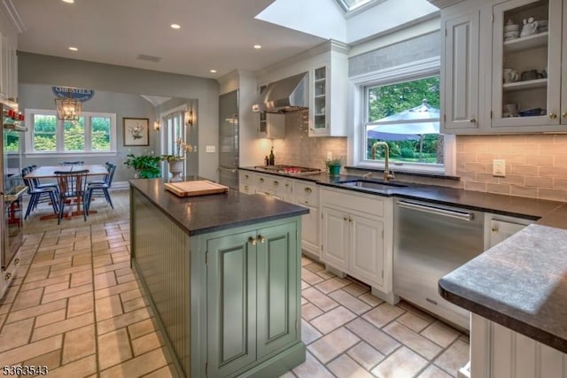 21 Sycamore Hill Rd, Bernardsville Boro, NJ 07924 - kitchen featuring appliances with stainless steel finishes, wall chimney range hood, dark countertops, tasteful backsplash, and recessed lighting