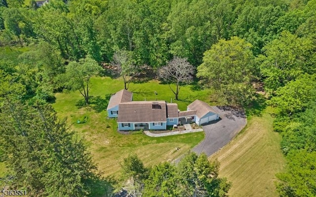 12 Schoolhouse Ln, Morris Twp, NJ 07960 - view of subject property with a heavily wooded area