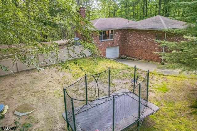 3 Christine Ct, Kinnelon Boro, NJ 07405 - view of yard with asphalt driveway and a garage