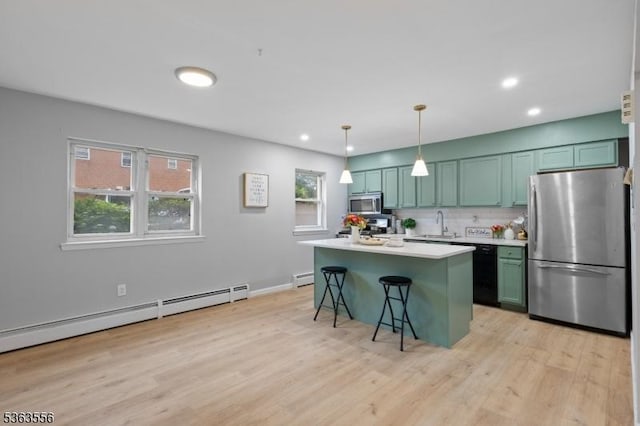 2467 State Route 10, Parsippany-Troy Hills Twp, NJ 07950 - kitchen with appliances with stainless steel finishes, light wood-style flooring, tasteful backsplash, light countertops, and recessed lighting