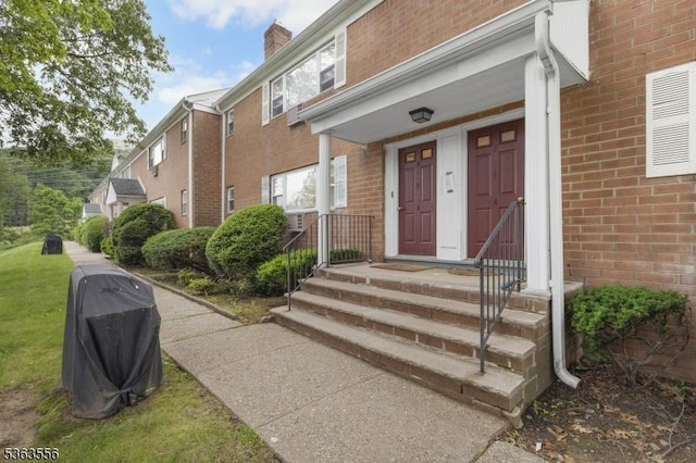 2467 State Route 10, Parsippany-Troy Hills Twp, NJ 07950 - entrance to property with brick siding and a chimney