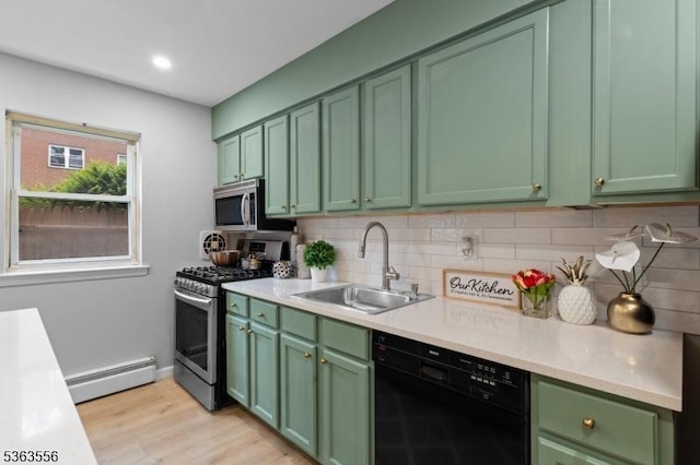 2467 State Route 10, Parsippany-Troy Hills Twp, NJ 07950 - kitchen with appliances with stainless steel finishes, green cabinetry, baseboard heating, and light countertops