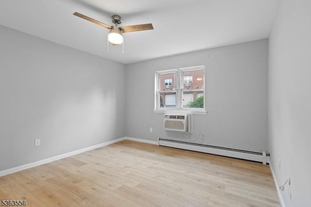 2467 State Route 10, Parsippany-Troy Hills Twp, NJ 07950 - spare room with baseboard heating, a wall mounted air conditioner, ceiling fan, and light wood-style flooring