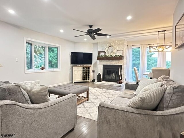 43 Kensington Ct, Washington Twp, NJ 07840 - living room with dark wood-type flooring, recessed lighting, a ceiling fan, and a fireplace