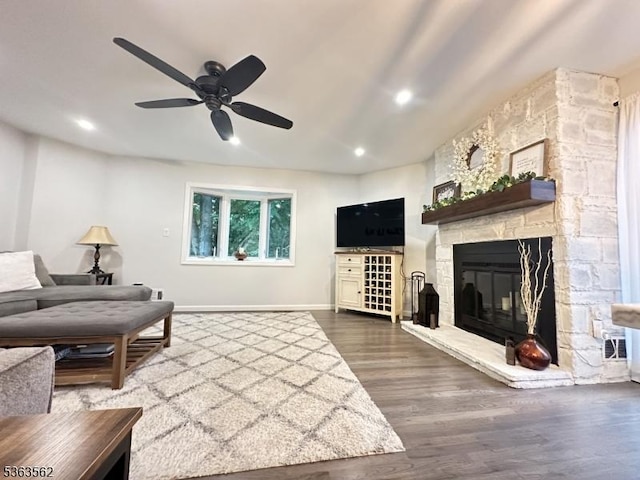 43 Kensington Ct, Washington Twp, NJ 07840 - living area with ceiling fan, a stone fireplace, wood finished floors, recessed lighting, and baseboards