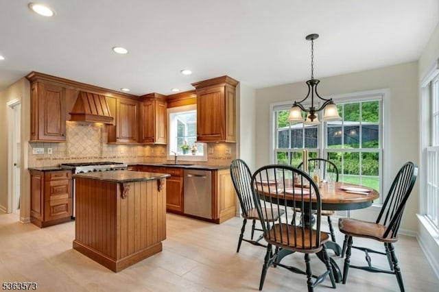11 Carteret Trl, Bernards Twp, NJ 07920 - kitchen with stainless steel dishwasher, dark countertops, custom exhaust hood, a kitchen island, and decorative backsplash