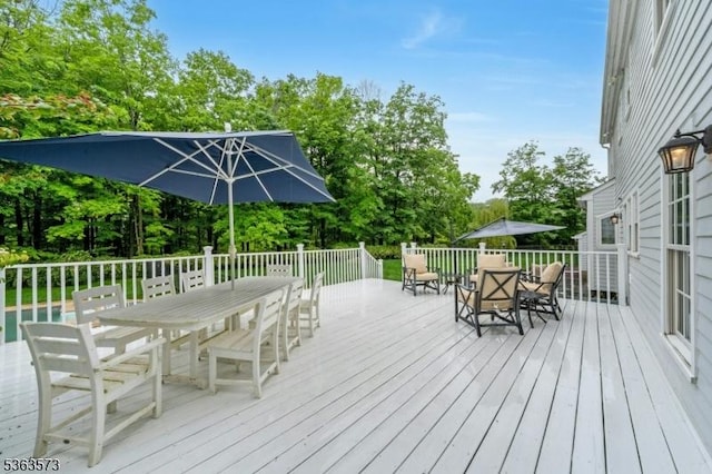 11 Carteret Trl, Bernards Twp, NJ 07920 - wooden terrace featuring outdoor dining area and view of scattered trees