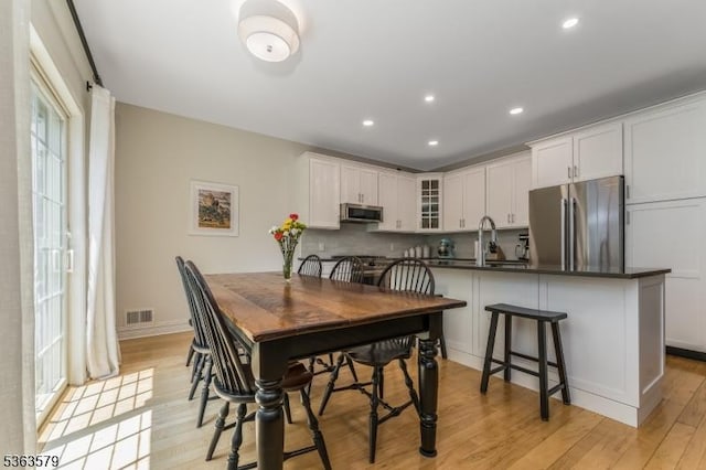 22 La Costa Dr, Clinton Twp, NJ 08801 - dining space with light wood finished floors, plenty of natural light, and recessed lighting