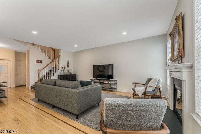 22 La Costa Dr, Clinton Twp, NJ 08801 - living area with stairs, light wood-type flooring, recessed lighting, and a fireplace