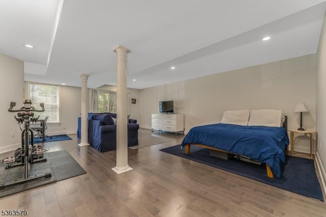 22 La Costa Dr, Clinton Twp, NJ 08801 - bedroom with ornate columns, wood finished floors, and recessed lighting