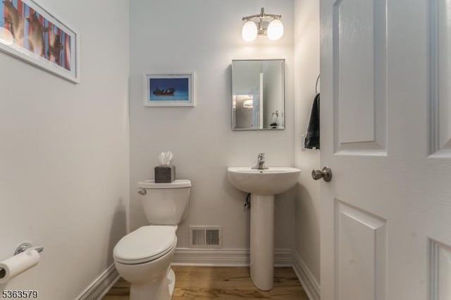 22 La Costa Dr, Clinton Twp, NJ 08801 - half bath with toilet and wood finished floors