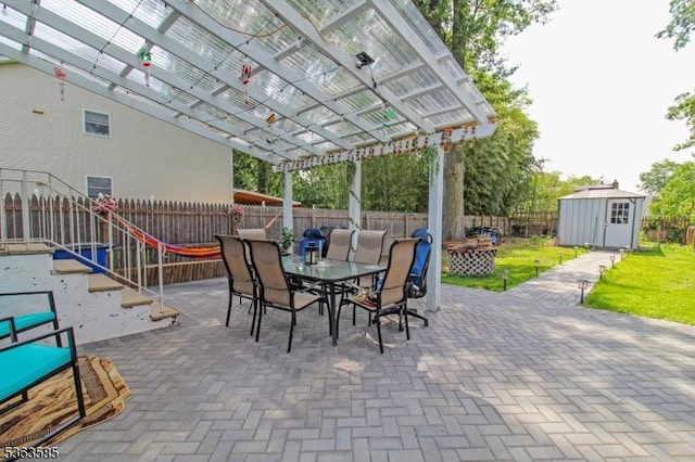 281 Oregon St, Union Twp, NJ 07088 - fenced backyard with outdoor dining space, a patio area, a shed, and a pergola