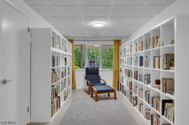 525 Watters Rd, Mansfield Twp, NJ 07840 - sitting room with wall of books, a drop ceiling, and carpet floors