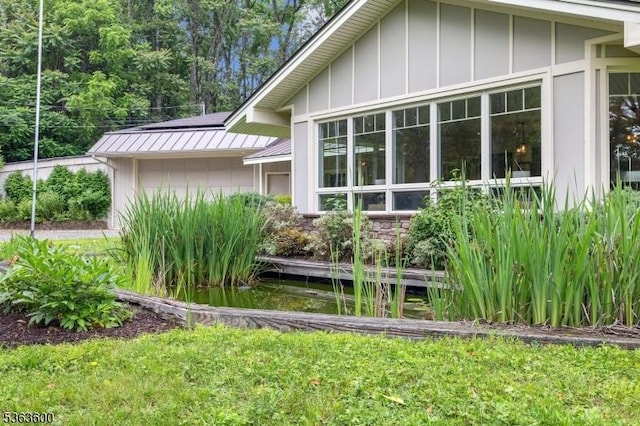 525 Watters Rd, Mansfield Twp, NJ 07840 - view of side of property featuring a standing seam roof, a metal roof, and board and batten siding